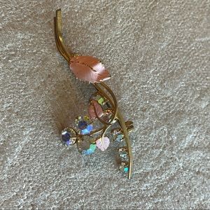 Gold pin with beautiful colorful rhinestone accents